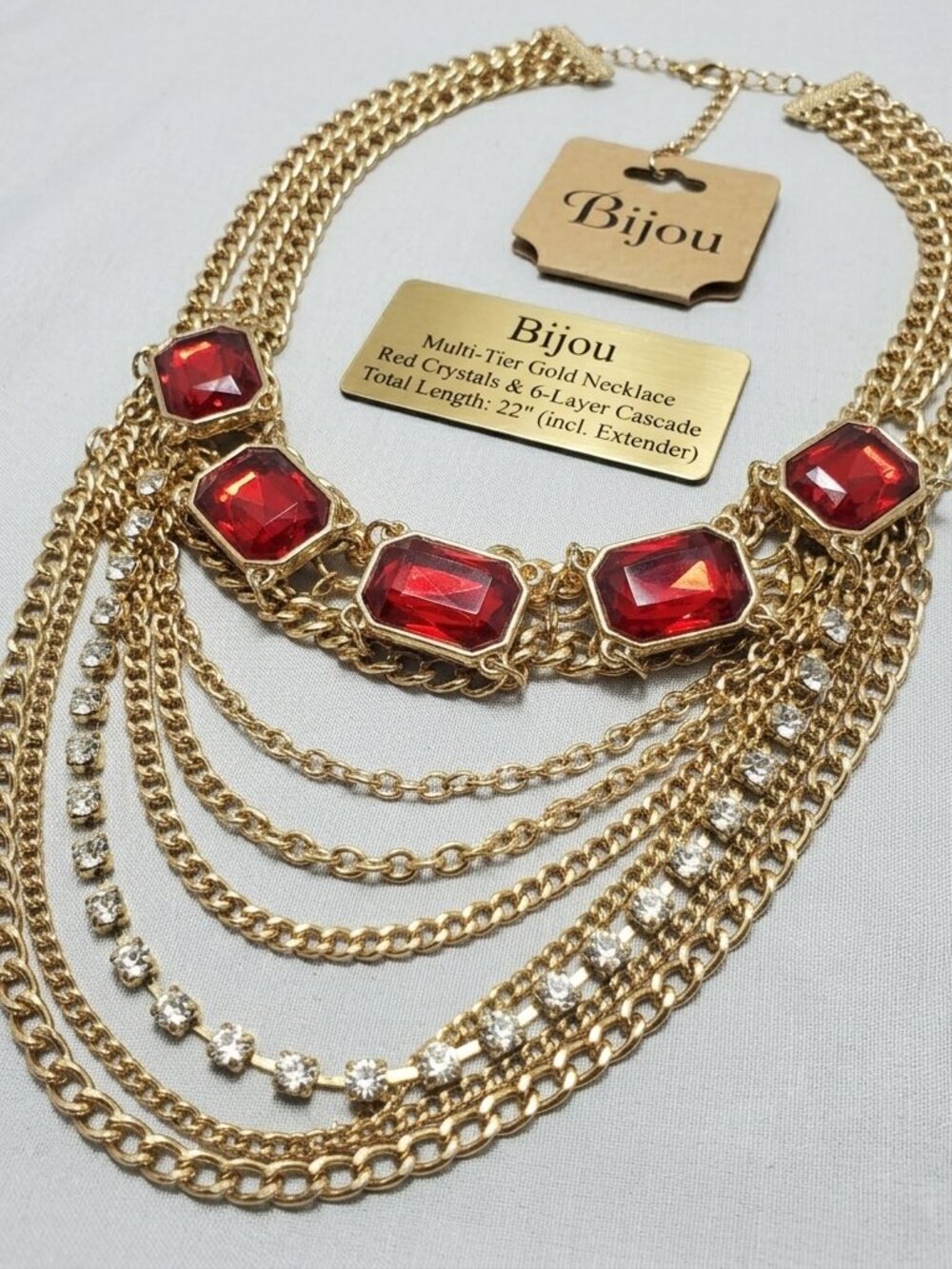 Bijou Drive gold 3 row chain with red crystal stones and 6 layer chain